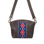 Lanita Small Crossbody in charcoal gray, front view with blue and red woven panel, studs and shoulder strap