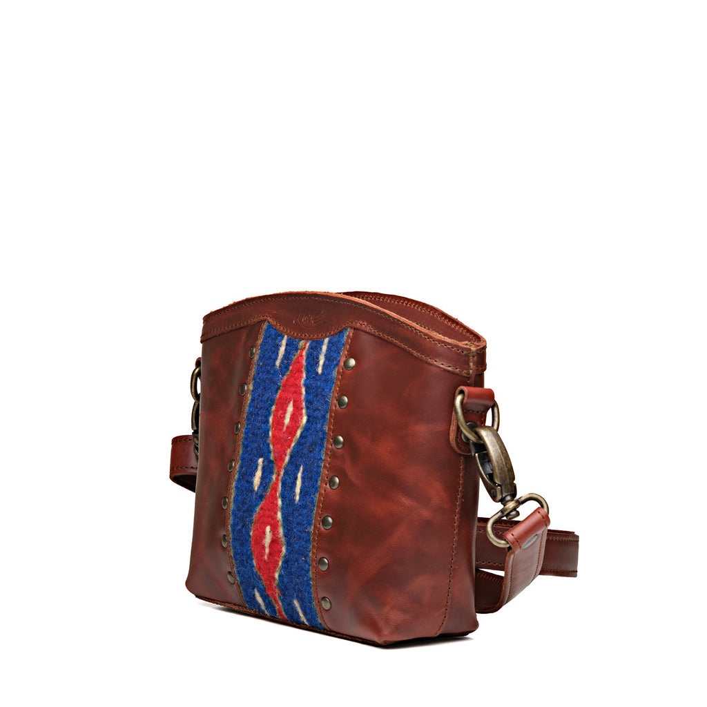 Lanita Small Crossbody in Chestnut, angled front view with woven panel and strap clip