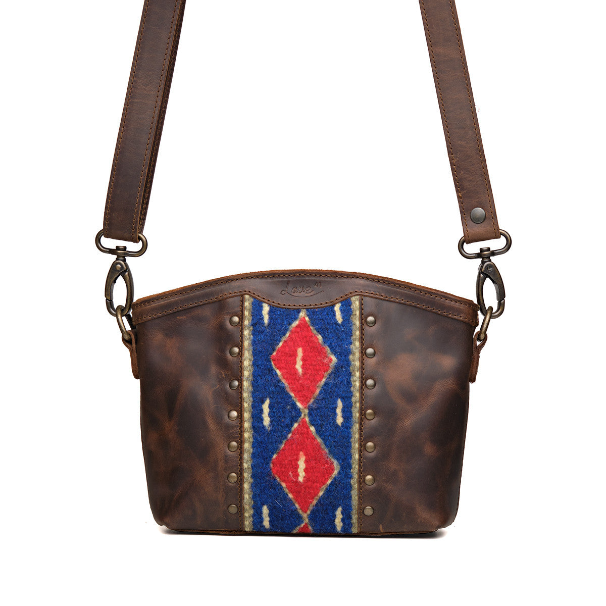 Lanita Small Crossbody in Dark Coffee Brown, front view with blue and red woven panel, studs and shoulder strap