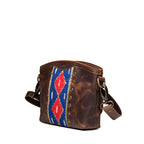 Lanita Small Crossbody in Dark Coffee Brown, angled front view with woven panel and strap clip