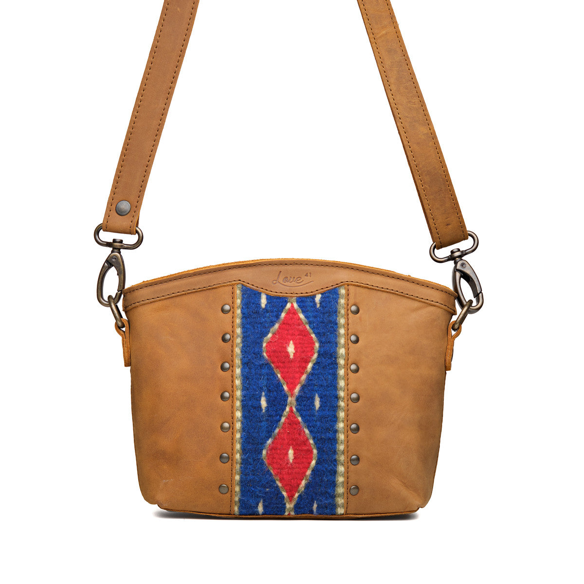 Lanita Small Crossbody in Tobacco, front view with blue and red woven panel, studs and shoulder strap