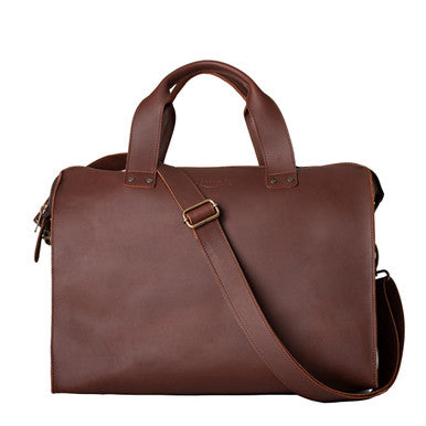 Simple Overnight Leather Duffle Bag in Chestnut, back view with shoulder strap attached