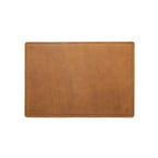 Desk Pad in Tobacco leather, empty top-down view showing stitched border and rounded corners