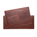 Long Desk Pad in Chestnut layered with the matching medium desk pad and mouse pad to compare sizes