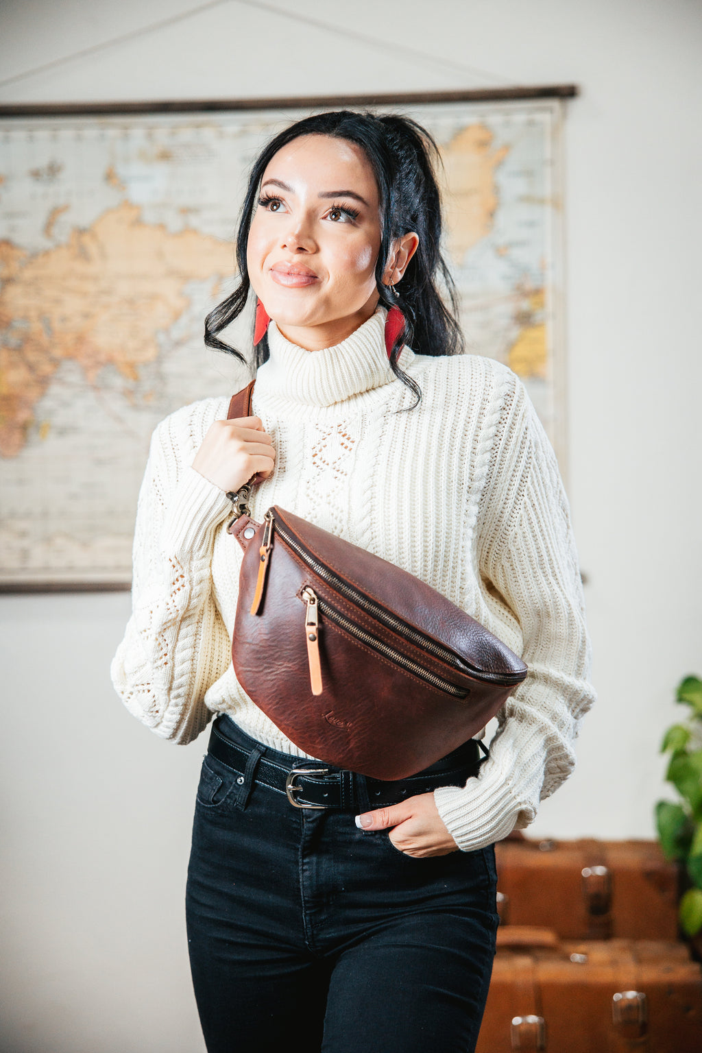 Leather Tumbled Fanny Bag in Chestnut, worn crossbody over a white turtleneck sweater