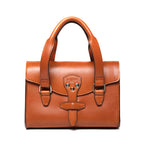 Double Handle Purse in English Tan, front view with twin top handles and latched front flap