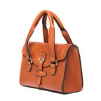 Double Handle Purse in English Tan, angled front view with twin handles and latched front flap