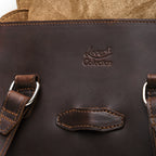 Double Handle Purse in Dark Coffee Brown, close-up of the embossed Love 41 Collection logo and stitched tab