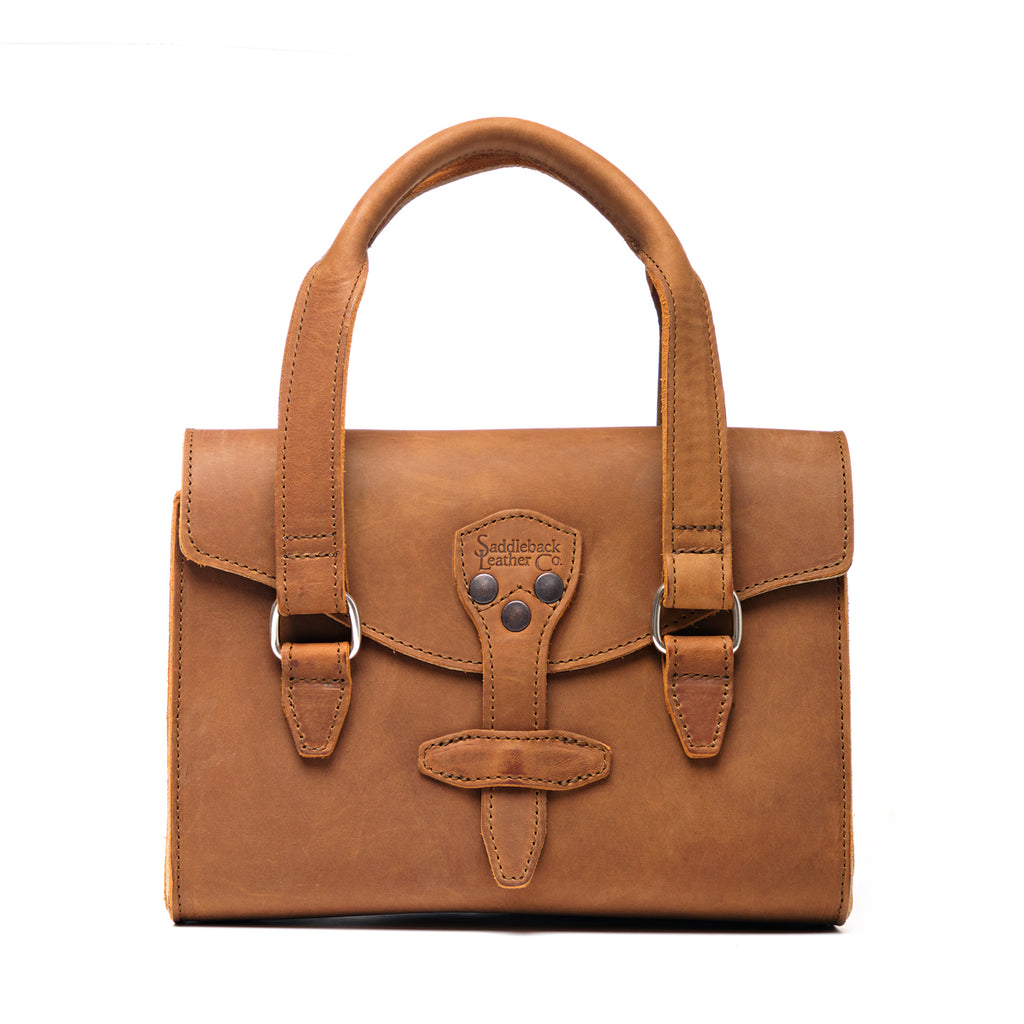 Double Handle Purse in Tobacco, front view with twin top handles and riveted flap closure