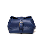 Saddleback Club Membership George Washington Leather Roll-Up Toiletry Bag in Blue, front view with buckle strap closure