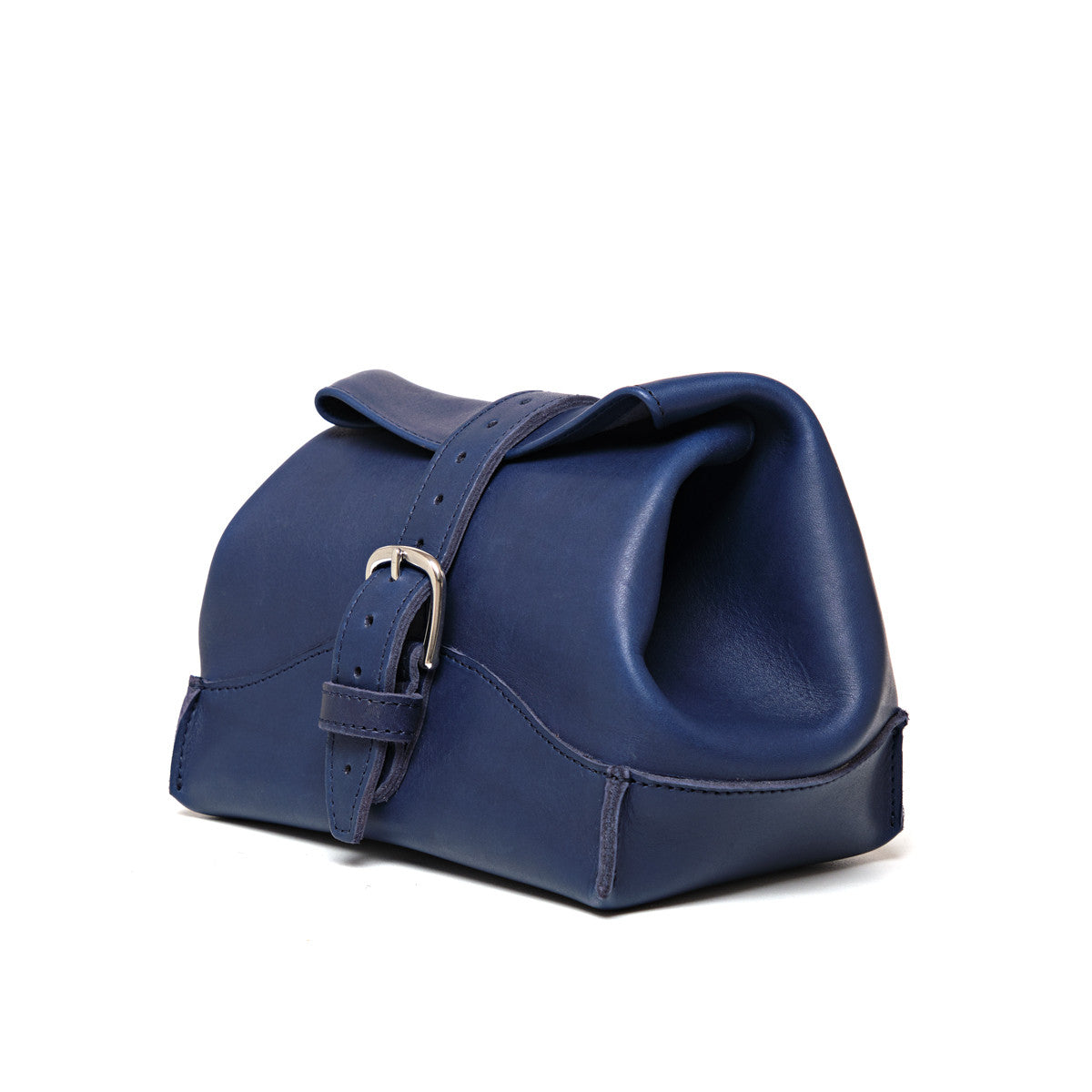 Saddleback Club Membership George Washington Leather Roll-Up Toiletry Bag in Blue, angled side view with buckle strap