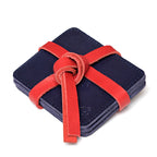 Saddleback Club Membership John Adams Leather Coaster Set in Blue and Red, navy coasters tied with a red leather strap
