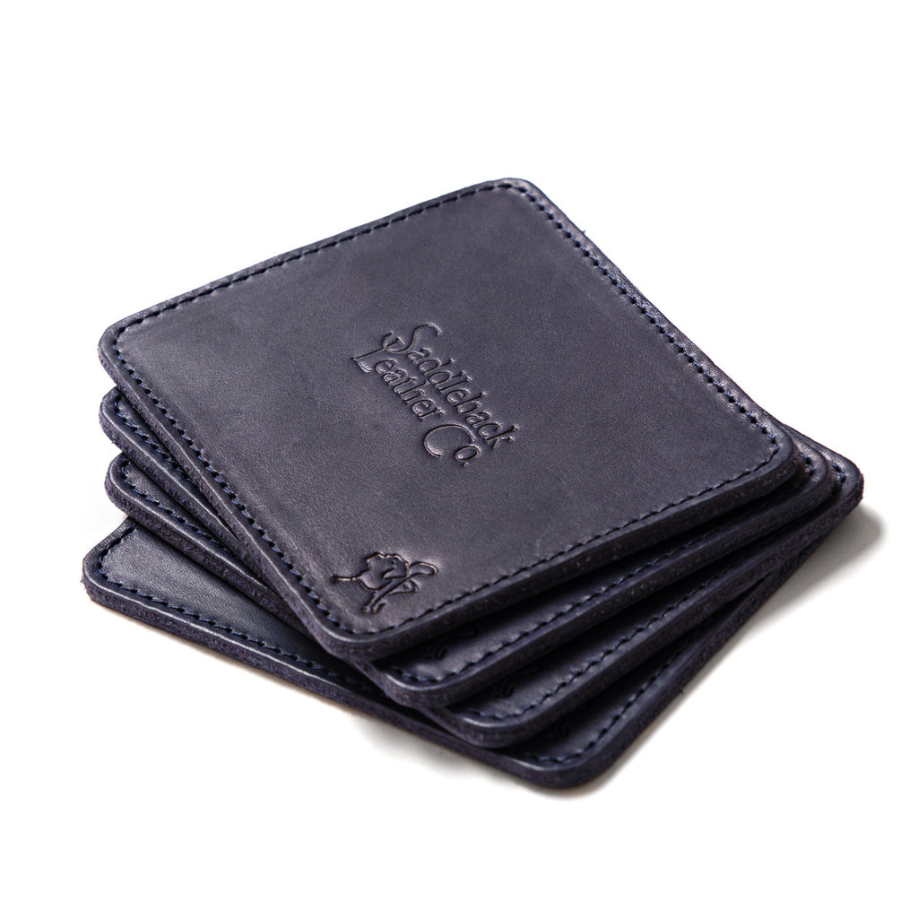 Saddleback Club Membership John Adams Leather Coaster Set in Blue and Red, stack of four embossed navy coasters