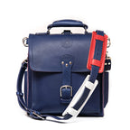 Saddleback Club Membership Paul Revere Leather Messenger Bag Backpack in Red, White and Blue, front view with shoulder strap