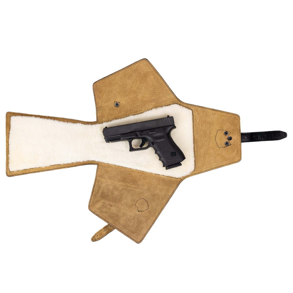 Leather Pistol Wrap in Tobacco fully unfolded, showing the fleece lining with a handgun inside