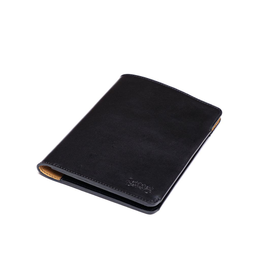 J.R.R. Tolkien Journal Cover in Raven Black, closed angled view with debossed logo