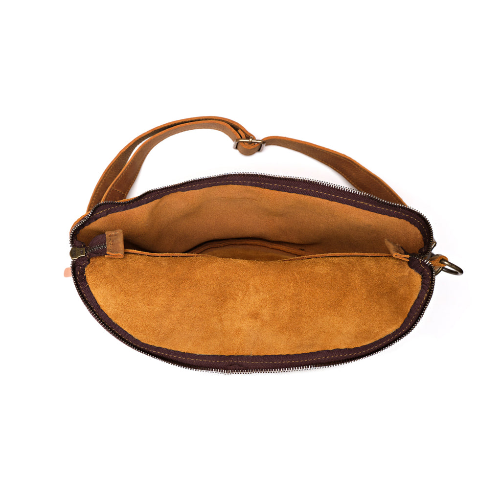 Leather Tumbled Fanny Bag in Tobacco, unzipped flat showing the empty suede-lined interior