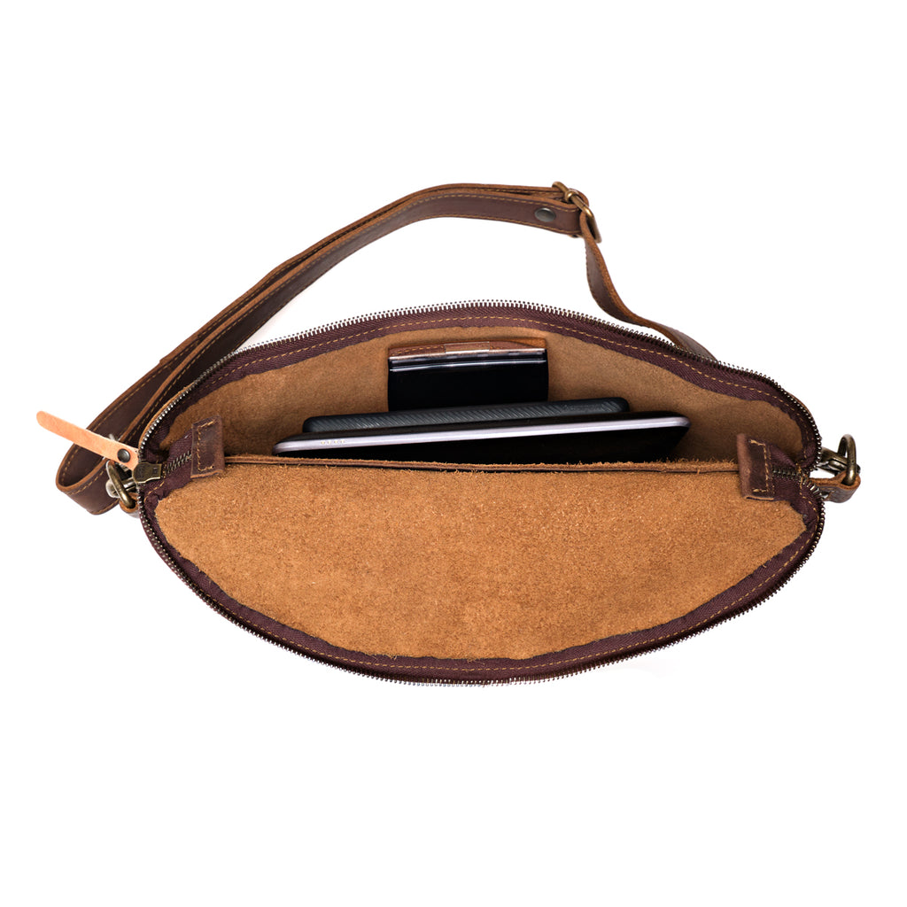 Leather Tumbled Fanny Bag in Dark Coffee Brown, unzipped flat showing a phone and cards in the interior pocket