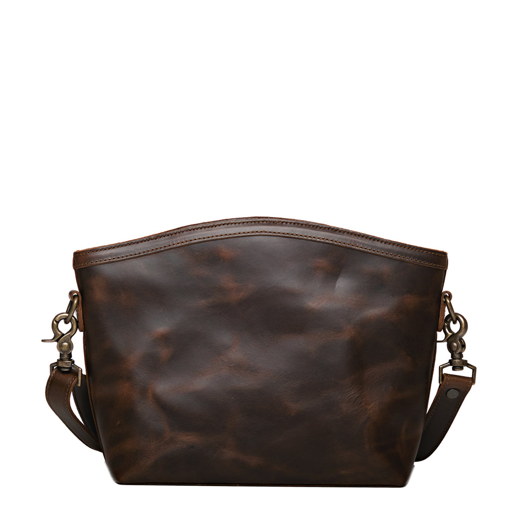 Lanita Medium Crossbody in Dark Coffee Brown, back view of plain leather side with strap clips