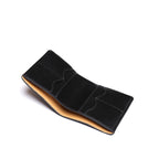 Large Bifold Wallet in Black, open empty view showing card slots and tan interior edge