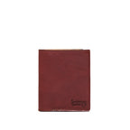 Large Bifold Wallet in Oxblood, closed front view with debossed Saddleback Leather Co. logo