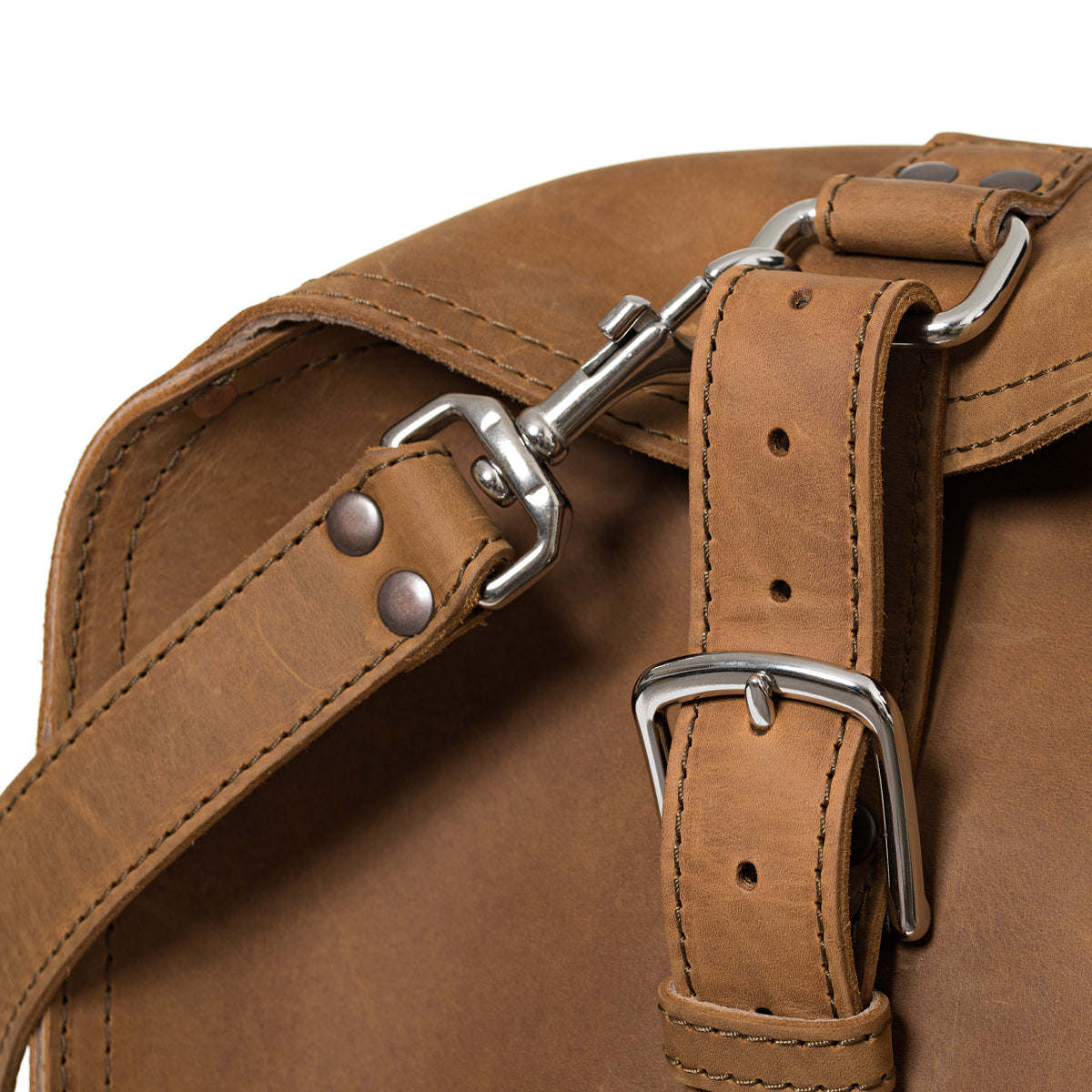 27" Adolescent Beast Duffle Bag in Tobacco, close-up of the end buckle strap and shoulder strap swivel hook