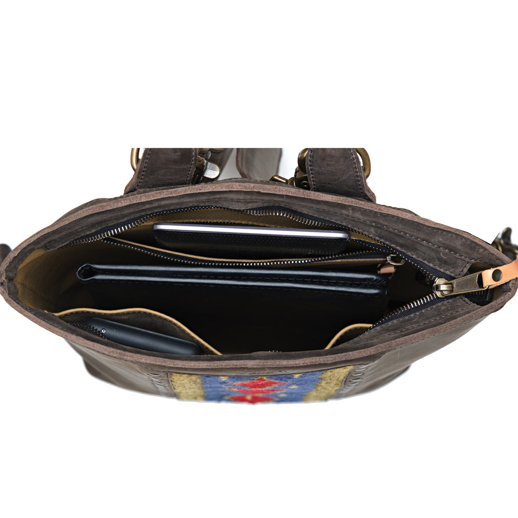 Lanita Leather Backpack in Dark Coffee Brown, top-down view of unzipped interior holding a laptop and phone
