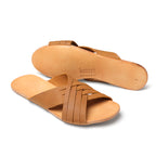 Martha Sandals in Tobacco, one sandal upright and one showing the sole with stamped logo