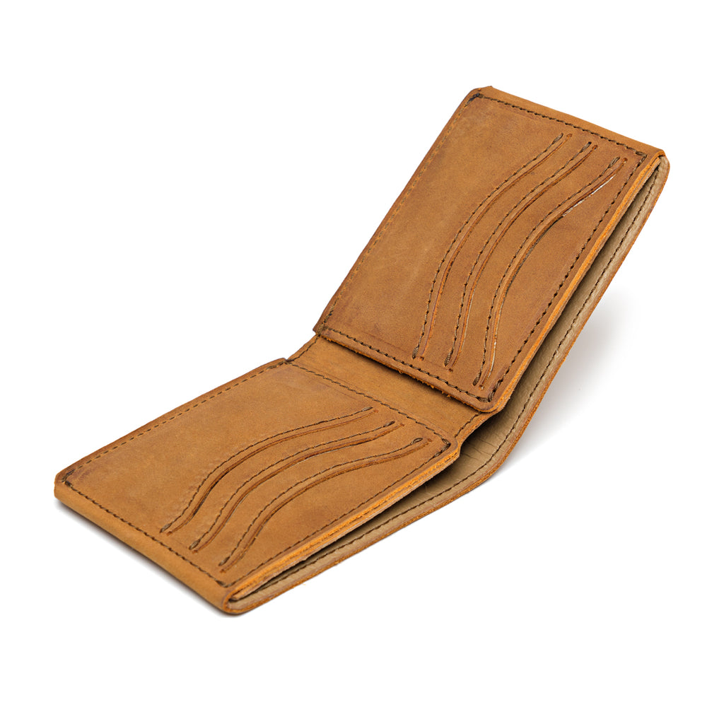 Medium Bifold Wallet in Tobacco opened empty at an angle to show the wavy stitched card slots