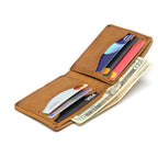 Medium Bifold Wallet in Tobacco opened at an angle, filled with cards in both pockets and folded cash