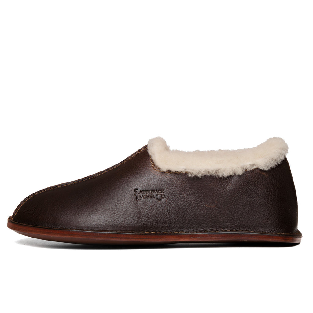 Sheepskin Moccasin in Dark Coffee Brown, side view with embossed logo and fleece collar