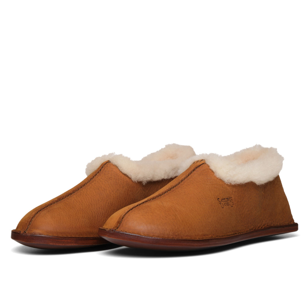Pair of Sheepskin Moccasins in Tobacco with fleece collars, angled front view