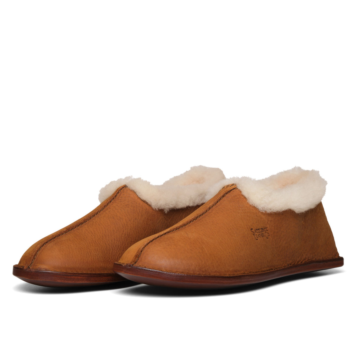 Pair of Sheepskin Moccasins in Tobacco with fleece collars, angled front view