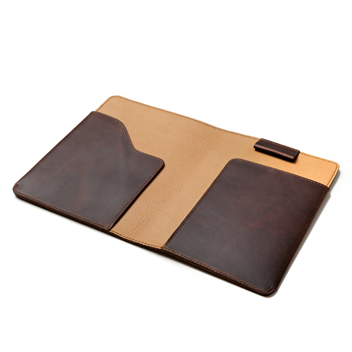 Medium Moleskin Cover in Dark Coffee Brown, open flat and empty showing interior pockets and pen loop