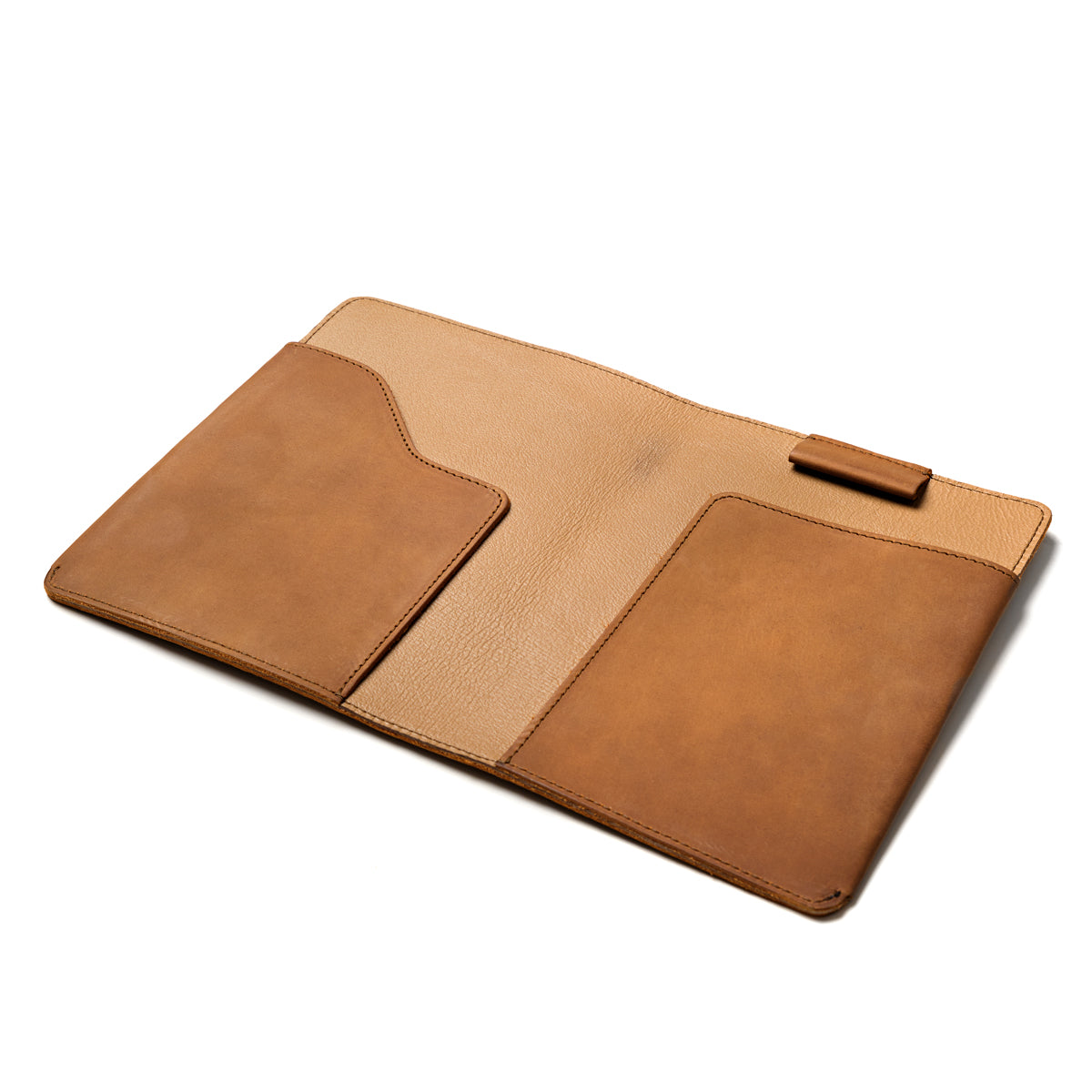 Medium Moleskin Cover in Tobacco, open flat and empty showing interior pockets and pen loop
