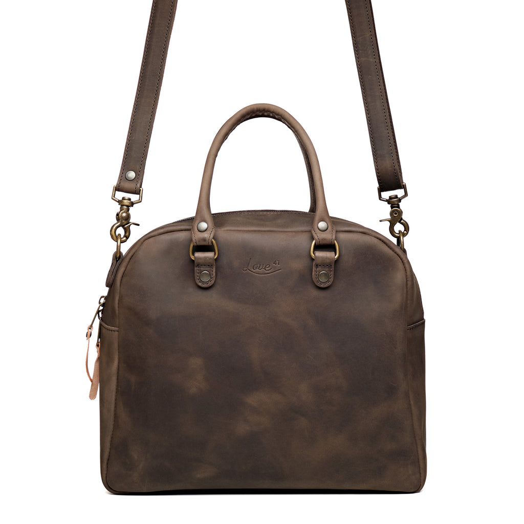 Professional Leather Satchel in Black, front view with top handle and detachable shoulder strap