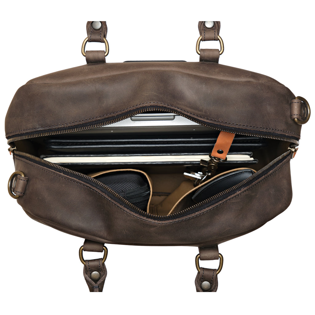 Professional Leather Satchel in Black, top view unzipped with a laptop, notebook and sunglasses inside