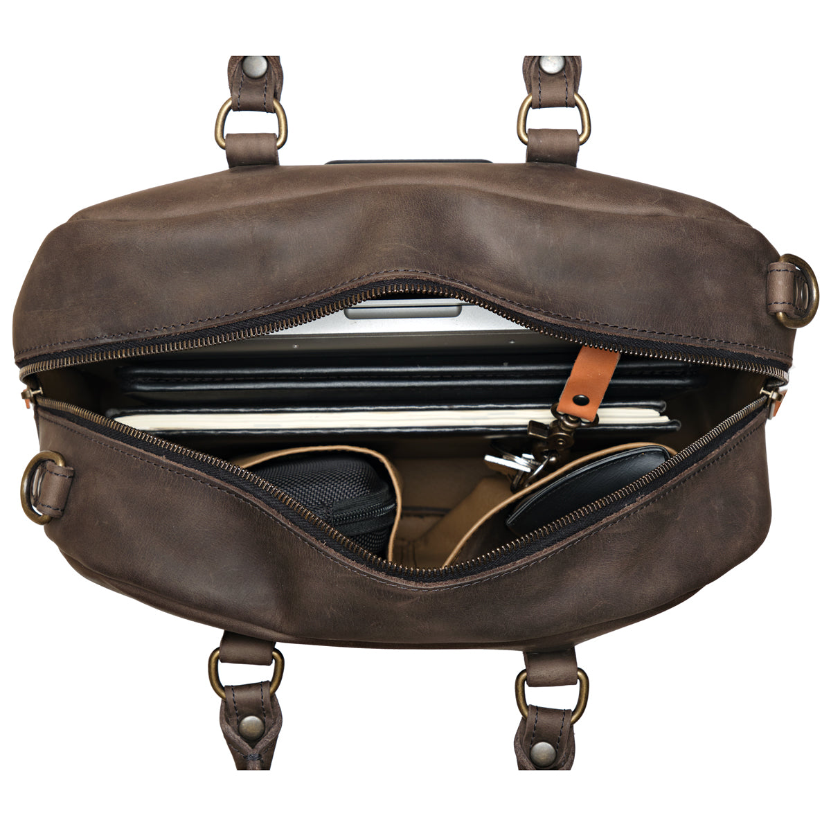 Professional Leather Satchel in Black, top view unzipped with a laptop, notebook and sunglasses inside