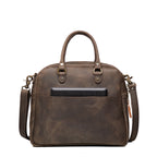 Professional Leather Satchel in Black, back view with a tablet tucked in the rear slip pocket