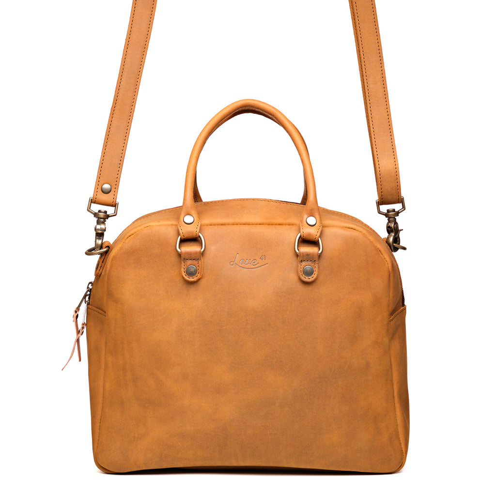Professional Leather Satchel in Tobacco, front view with top handle and detachable shoulder strap