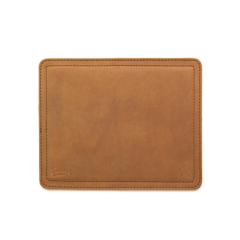 Mouse Pad in Tobacco leather, empty top-down view with stitched border and embossed logo