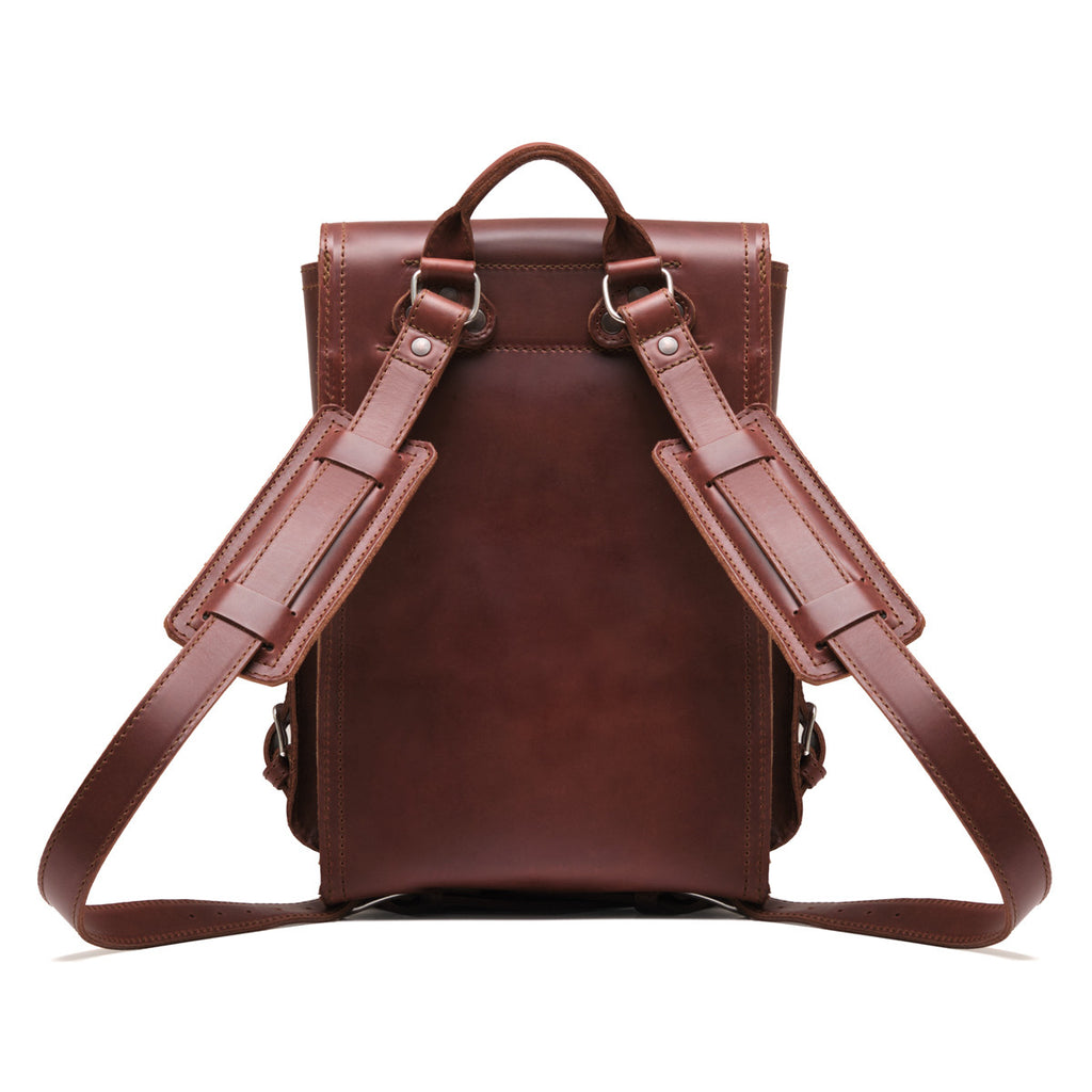 Small Front Pocket Backpack in Chestnut, back view showing the padded shoulder straps and top handle