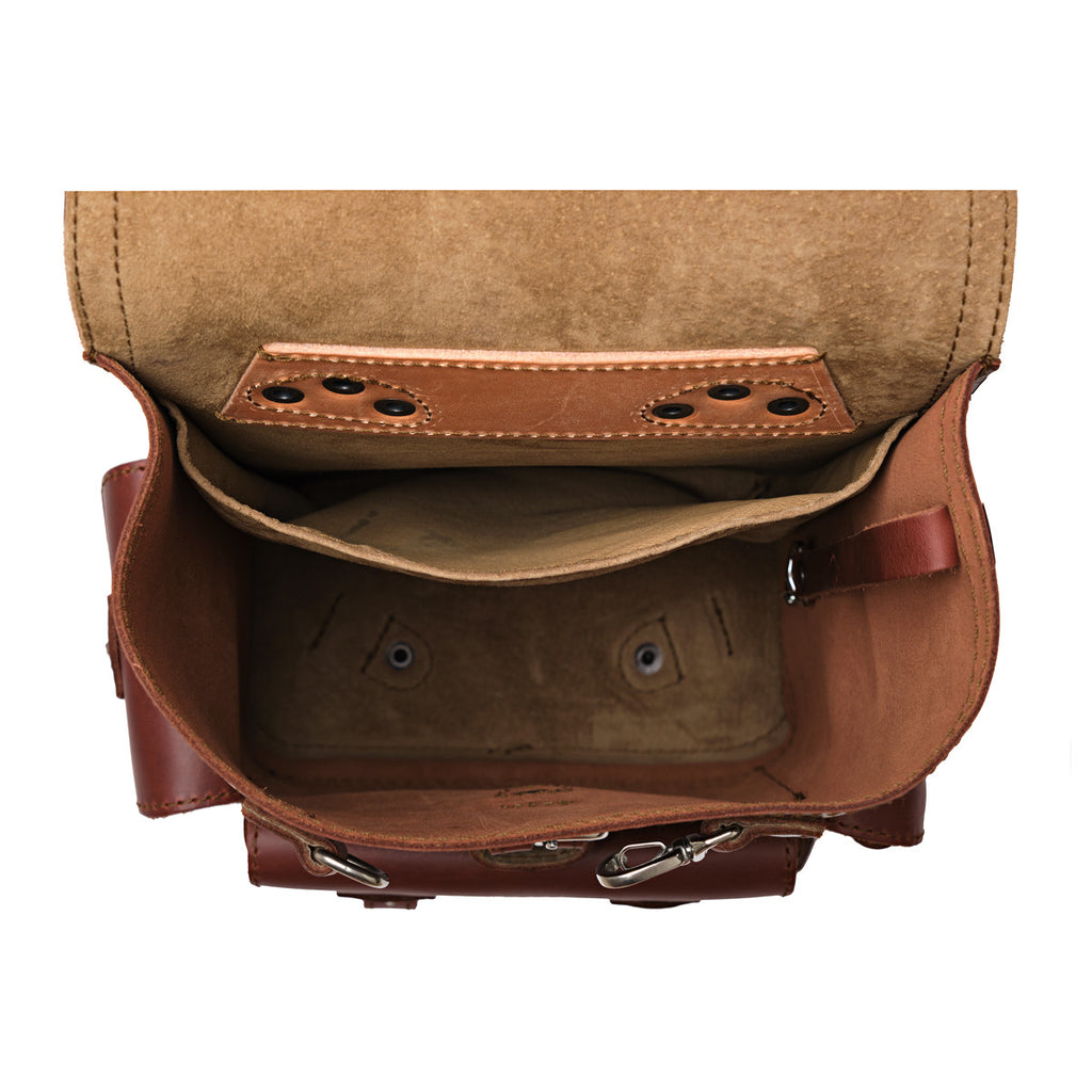Small Front Pocket Backpack in Chestnut, top-down view into the open main compartment with an inside pocket