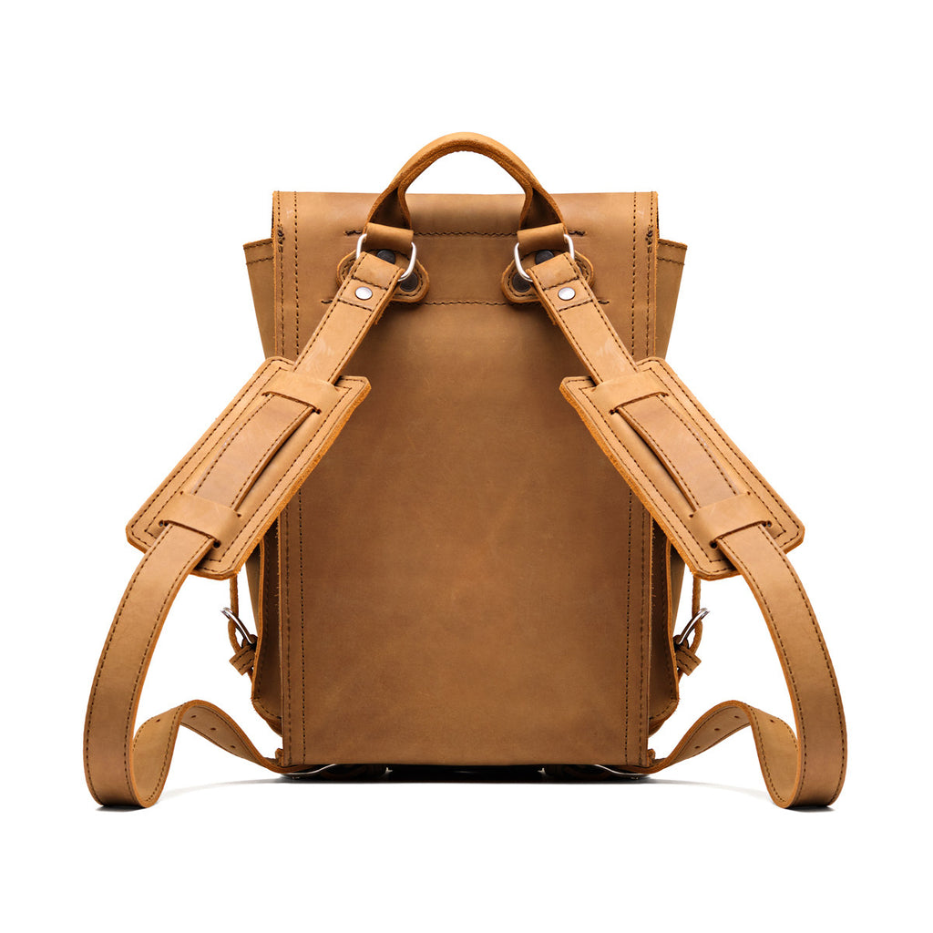 Small Front Pocket Backpack in Tobacco, back view showing the padded shoulder straps and top handle