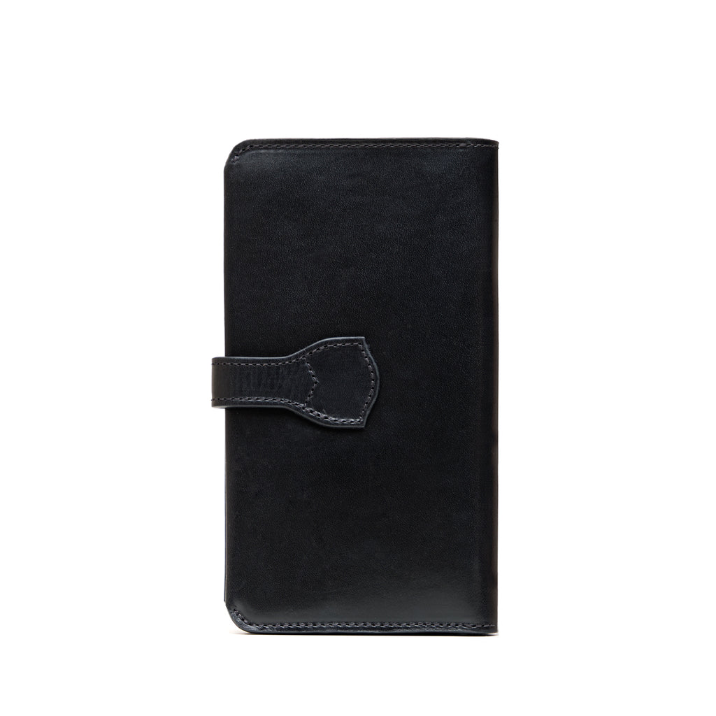 Big Wallet in Raven Black, closed back view with the strap tab wrapping around