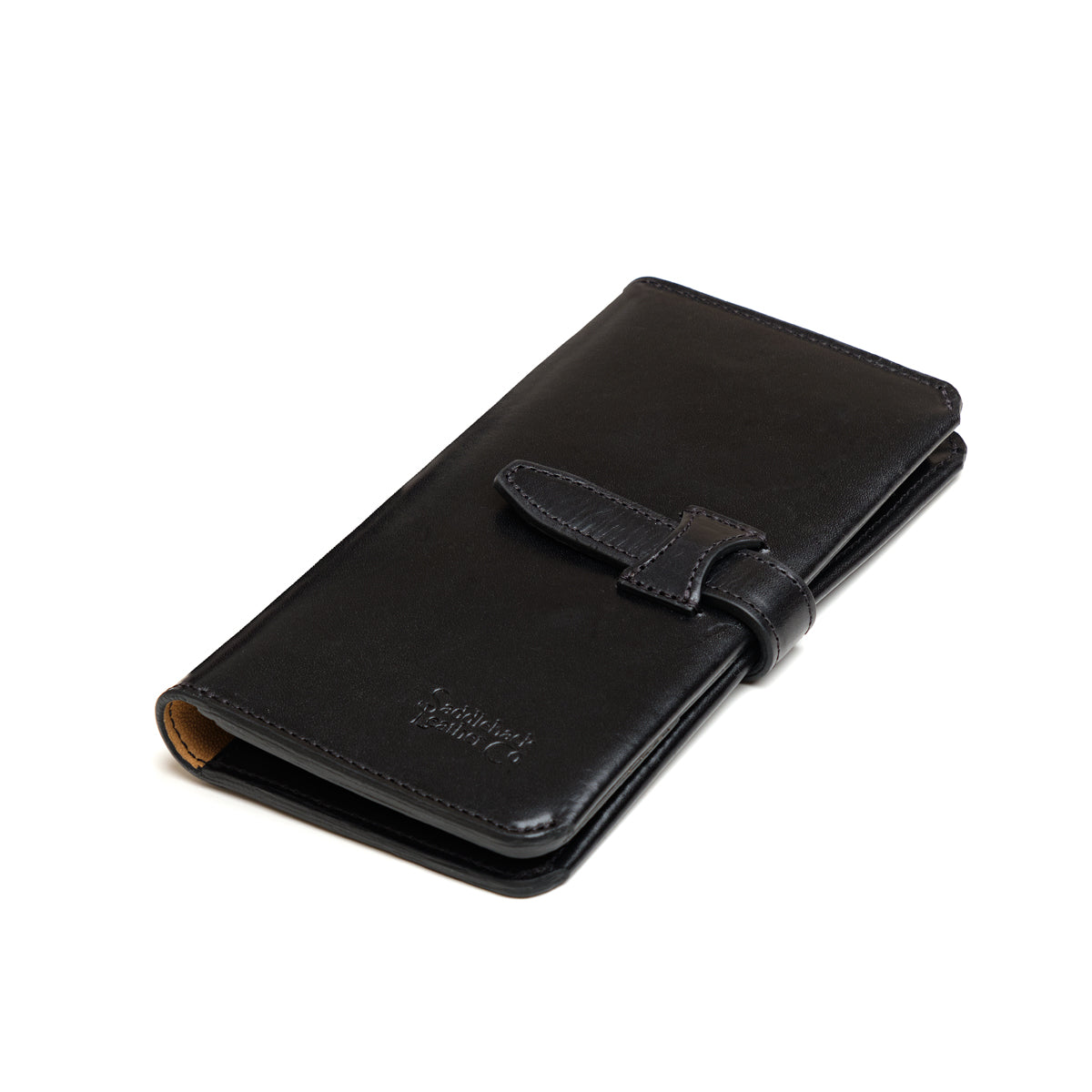 Big Wallet in Raven Black, closed angled view with strap closure and debossed logo
