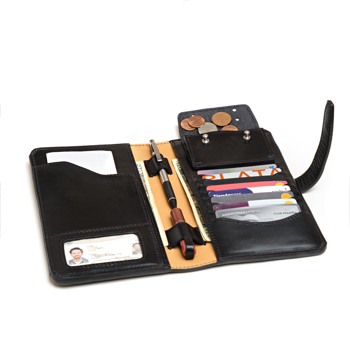 Big Wallet in Raven Black, open and loaded with cards, ID, pens, cash and coins in the snap pocket