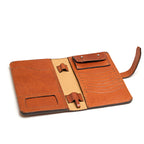 Big Wallet in English Tan, fully open showing card slots, ID window, snap pocket and pen loops