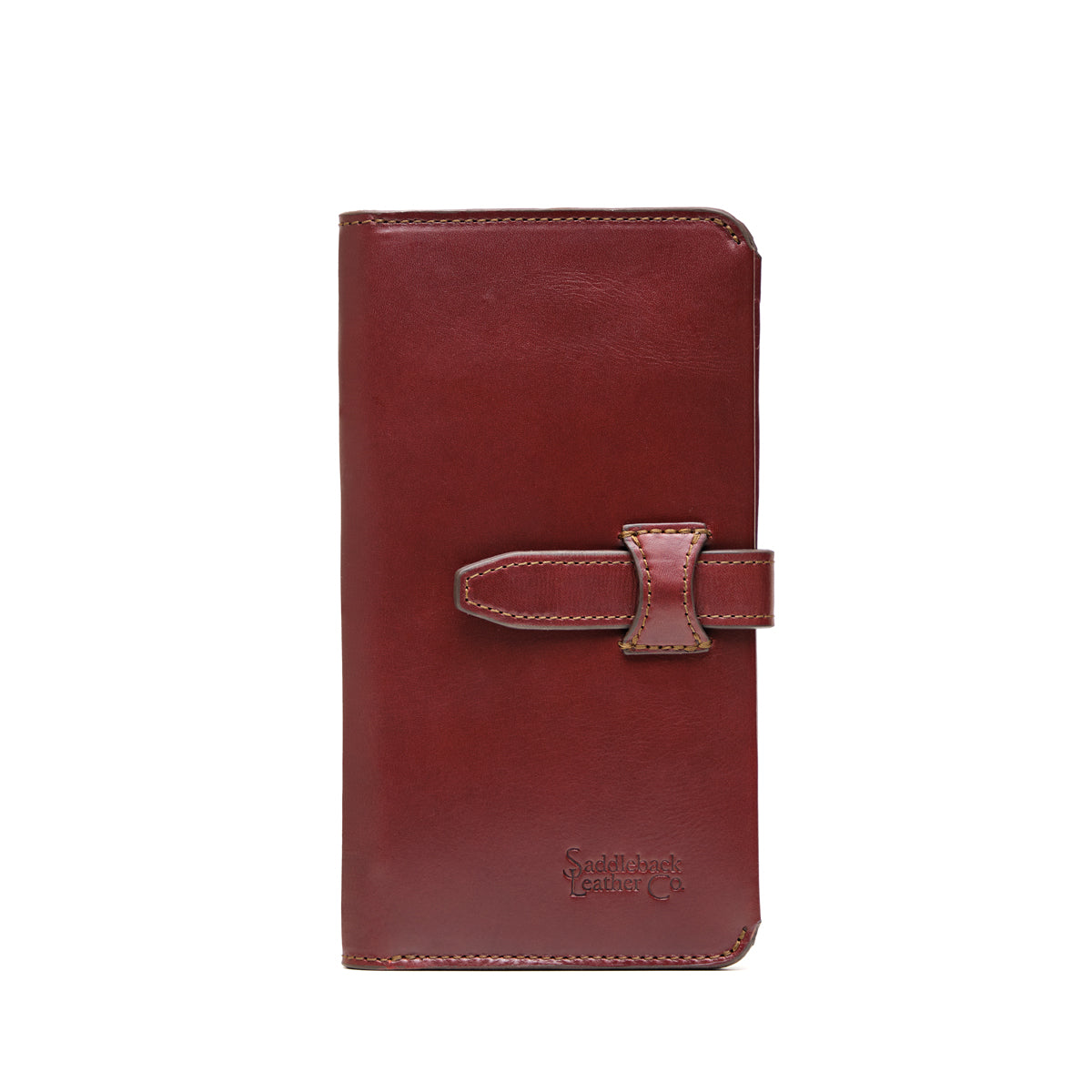 Big Wallet in Oxblood, closed front view with strap closure and debossed Saddleback Leather Co. logo