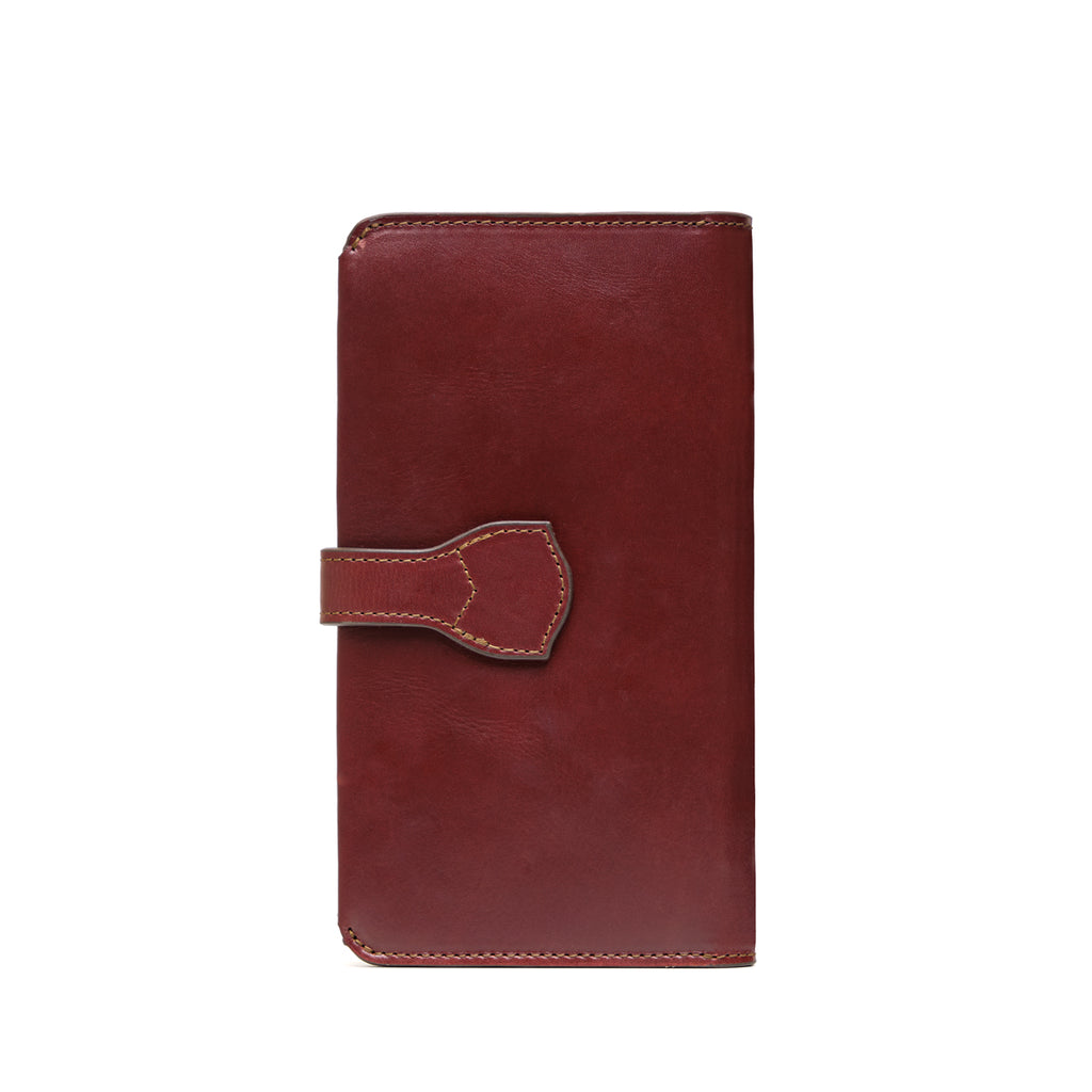 Big Wallet in Oxblood, closed back view with the strap tab wrapping around